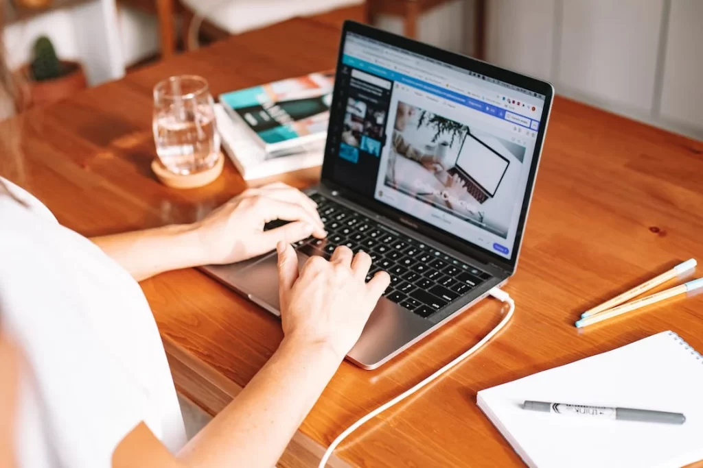 A landing page expert at Mumbai Web Design working on a laptop.
